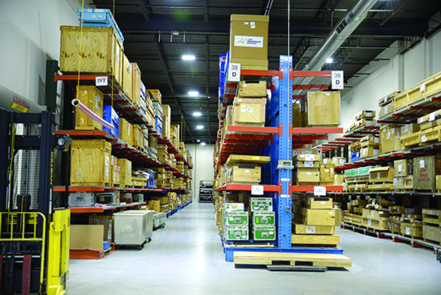 The first phase of the lighting project focused on replacing the existing fixtures in the high-bay warehouse space with intelligent LED fixtures.