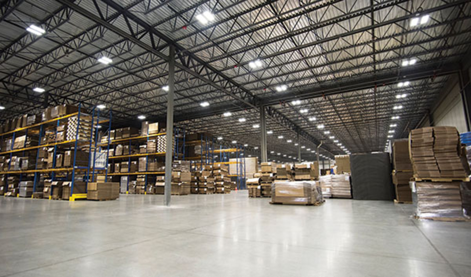 Intelligent lighting controls also are favored for warehouse applications, where they control not only lighting but can interface with inventory-management systems. Photo: Digital Lumens.