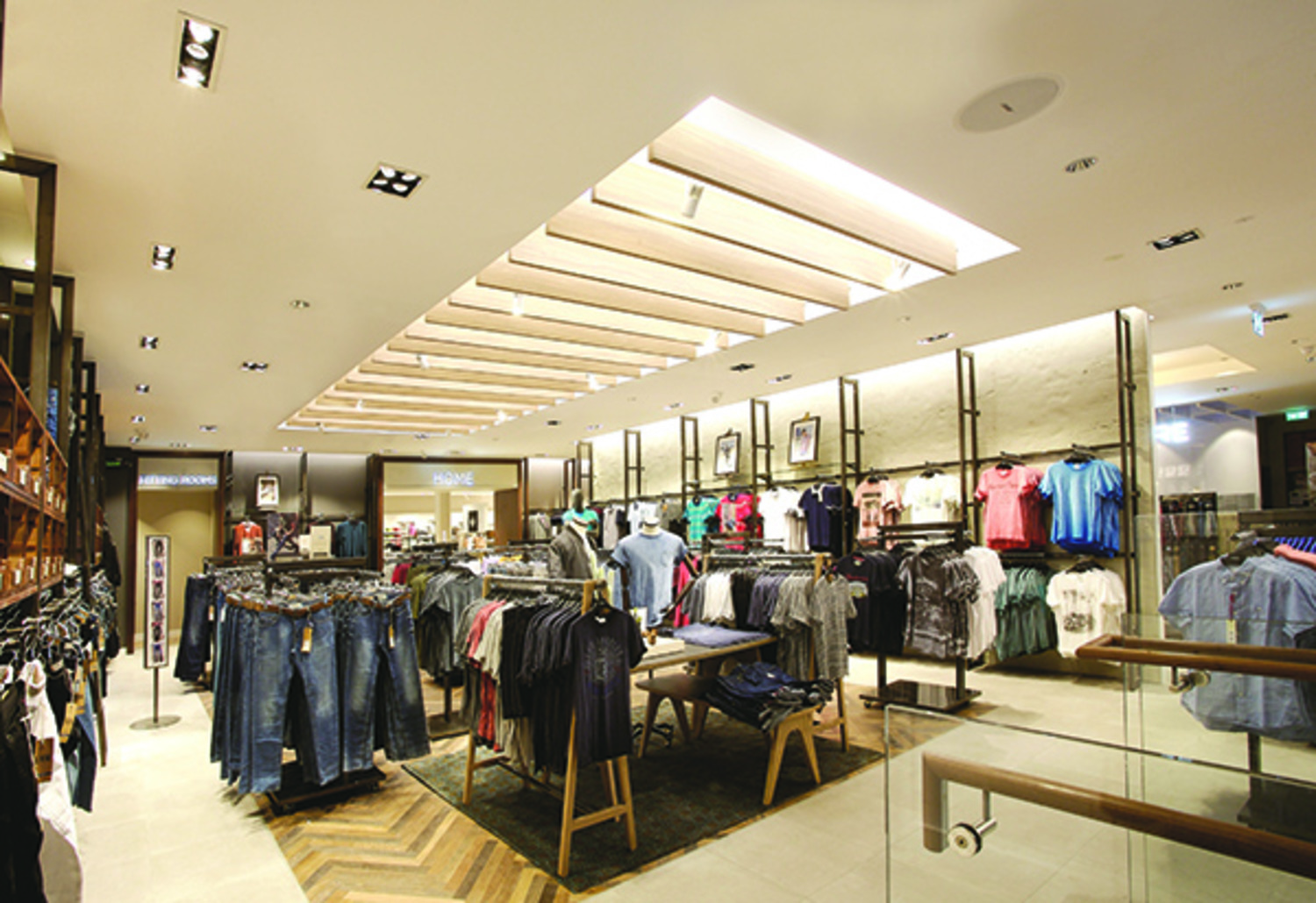 In an ongoing effort to improve efficiency and the customer experience, UK fashion retailers Next have turned their store in Rugby, Warwickshire, into a test bed for new lighting applications and technology using Lumenpulse and Lumentalk technology. Photo: Ian Robinson, courtesy Lumenpulse