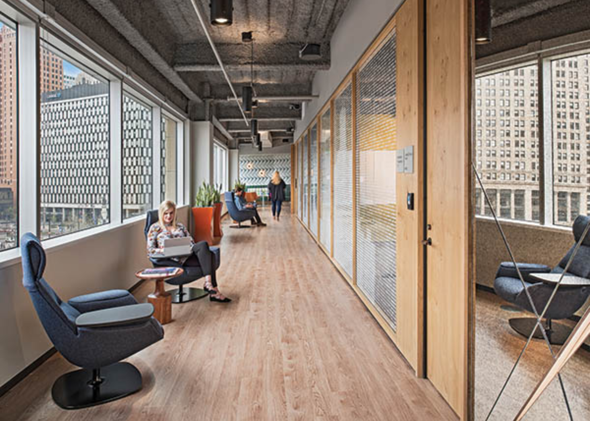 The technology center combines residential and commercial design elements. Lighting in the common spaces and corridors is intended to set a calming mood, contributing to a hospitality feel