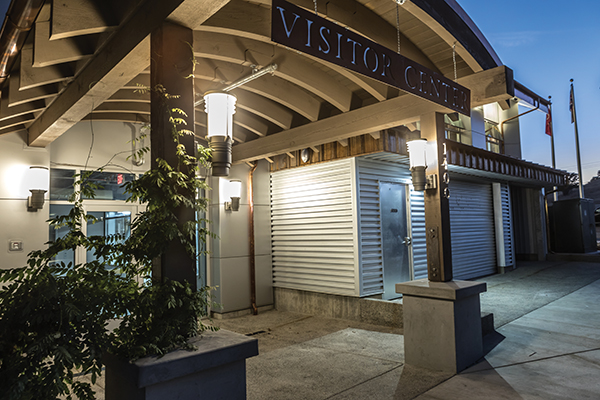Eclipse Mini EC612 luminaires withstand extreme weather conditions and are mounted to the wall either side of the front door and on the columns supporting the covered entry